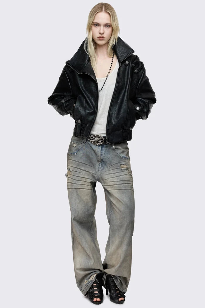 Black faux leather bomber jacket with military shoulder details, wide lapel collar, asymmetric zip and oversized fit.