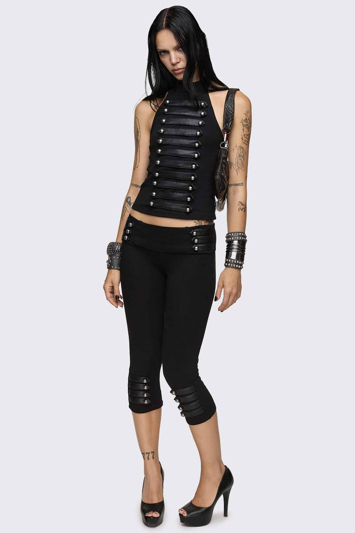 Black halter neck tank top with faux leather front straps, silver dome buttons and slim fit.