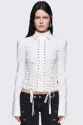 White cotton shirt with corset lace-up panels, puffed shoulders and eyelet details in a whimigoth style.