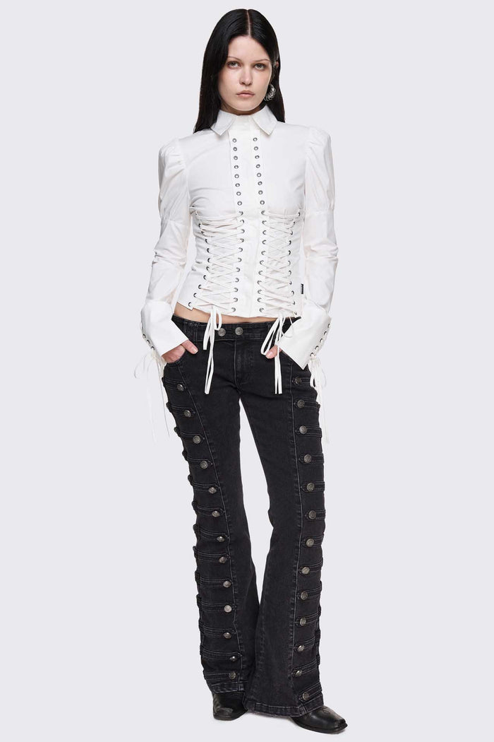 White cotton shirt with corset lace-up panels, puffed shoulders and eyelet details in a whimigoth style.