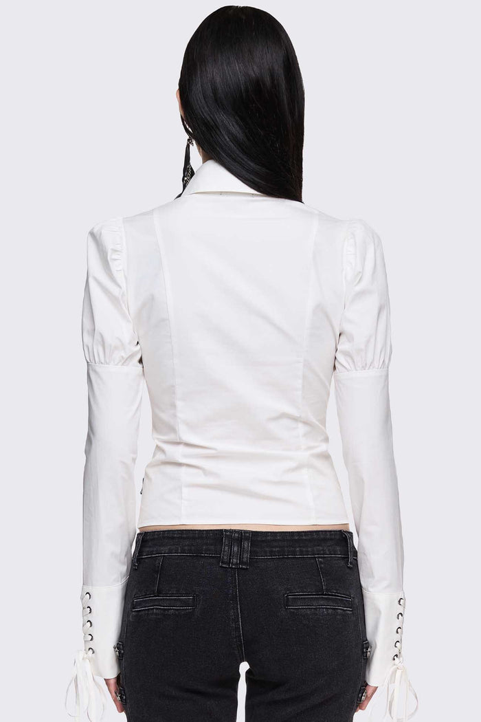 White cotton shirt with corset lace-up panels, puffed shoulders and eyelet details in a whimigoth style.