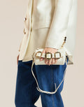 Ivory Buckle Mini Crossbody Bag