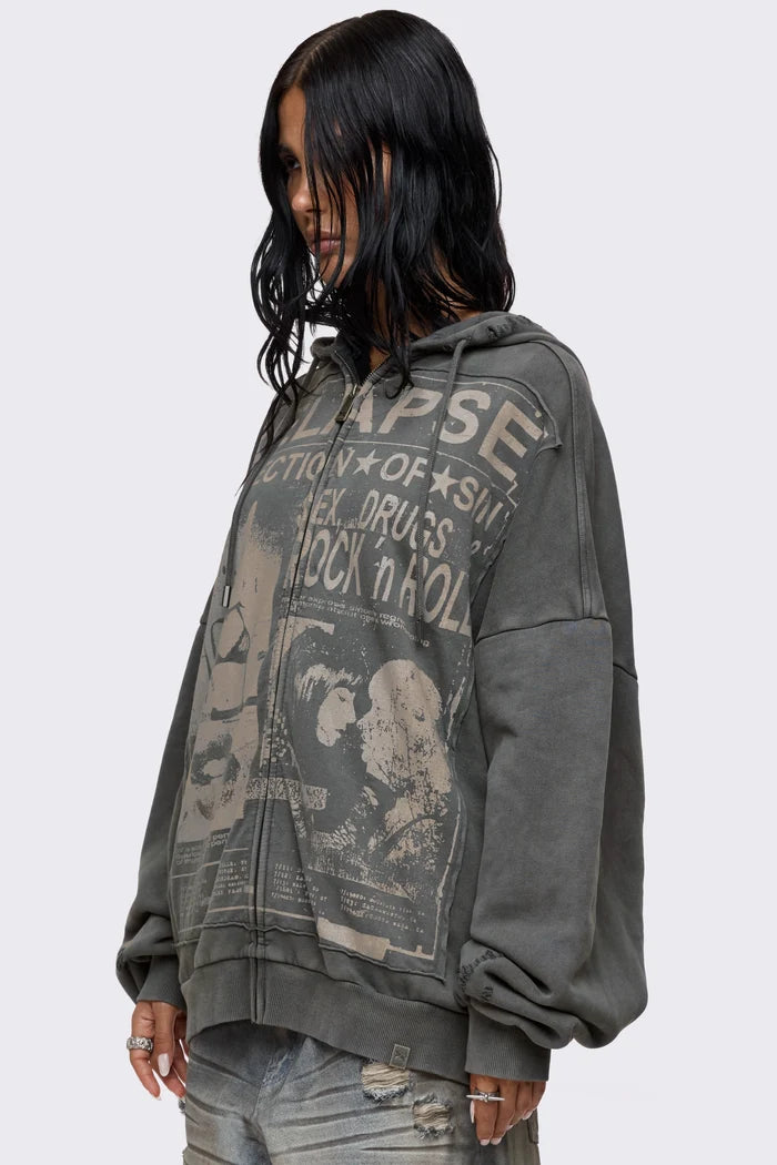 Grey washed zip up hoodie with Relapse graphic print, distressed details and oversized fit on model.