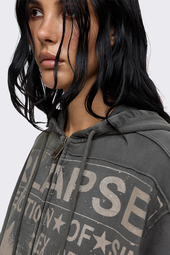 Grey washed zip up hoodie with Relapse graphic print, distressed details and oversized fit on model.