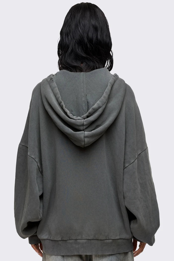 Grey washed zip up hoodie with Relapse graphic print, distressed details and oversized fit on model.