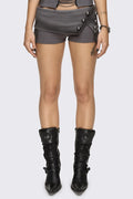 Grey washed jersey hot pants with side cutouts, silver chains and a studded fold-over low rise waistband.